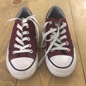 Maroon all star converses.